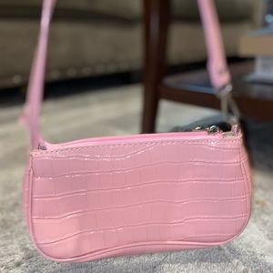 Pink faux croc print handbag